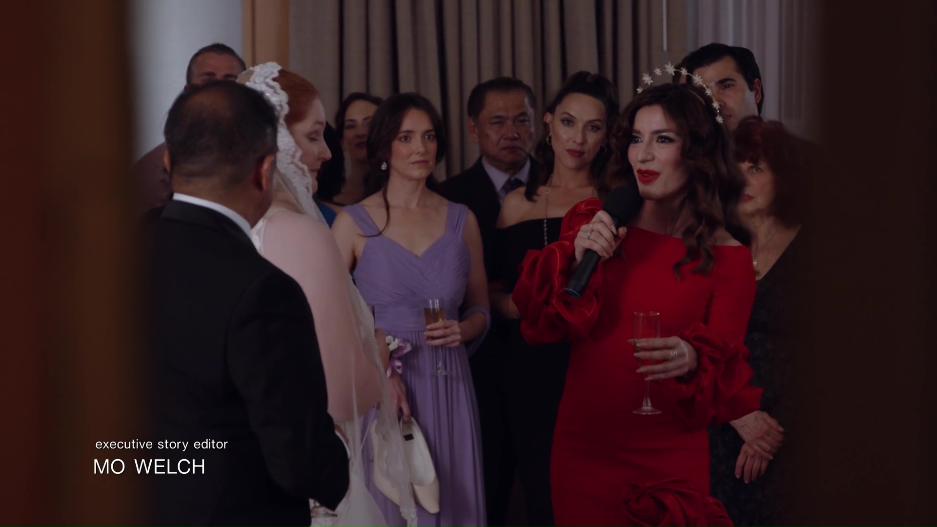 Esmeralda: I would like to make a toast to this beautiful, beautiful couple. My love, you are much shorter, right? Oh, my God. Well, how does this work?